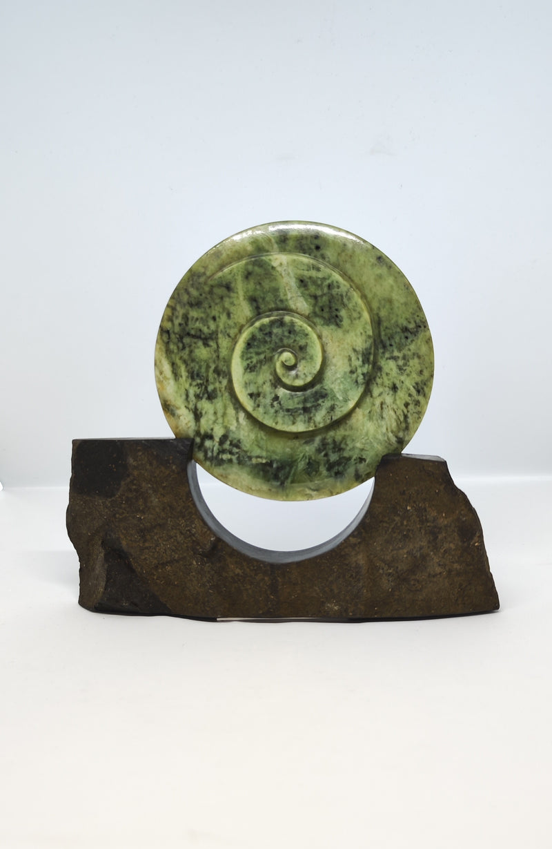 Sands Carving - Koru Disc Sculpture